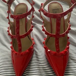 Red stud heels